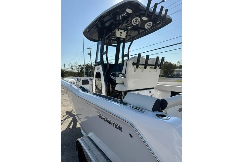 Slide: The Image of 2023 Tidewater 232 SS boat with sleek design and modern features. - 5