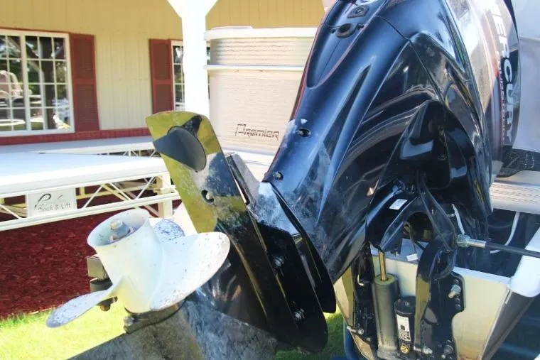 Slide: The Image of 2008 Premier 221 Cast-A-Way boat with Mercury outboard motor and propeller. - 15