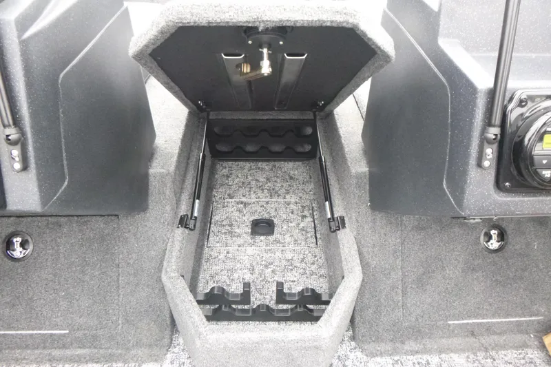 Slide: The Image of 2026 Tracker Targa V-19 Combo boat interior with foot pedal and wiring details. - 10