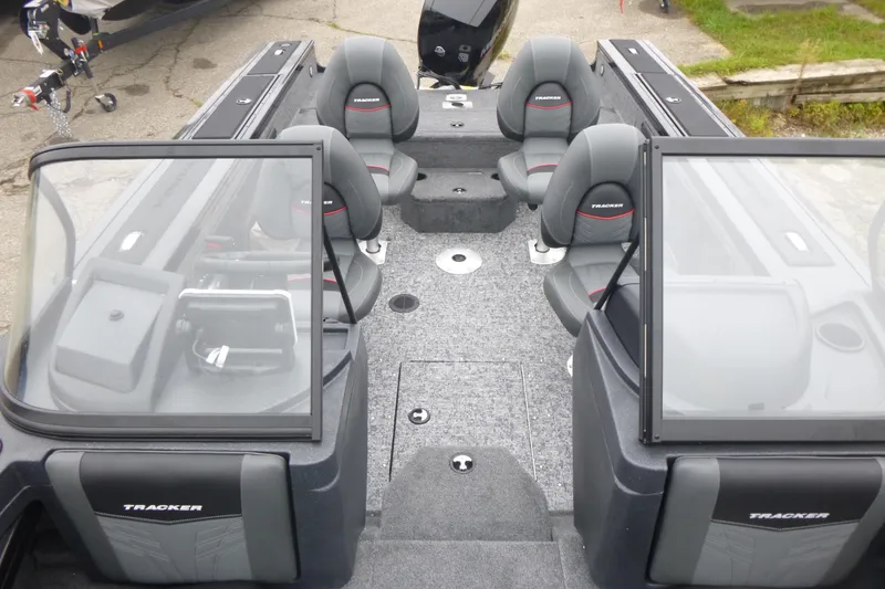 Slide: The Image of 2026 Tracker Targa V-19 Combo boat interior with seating and windshield. - 5