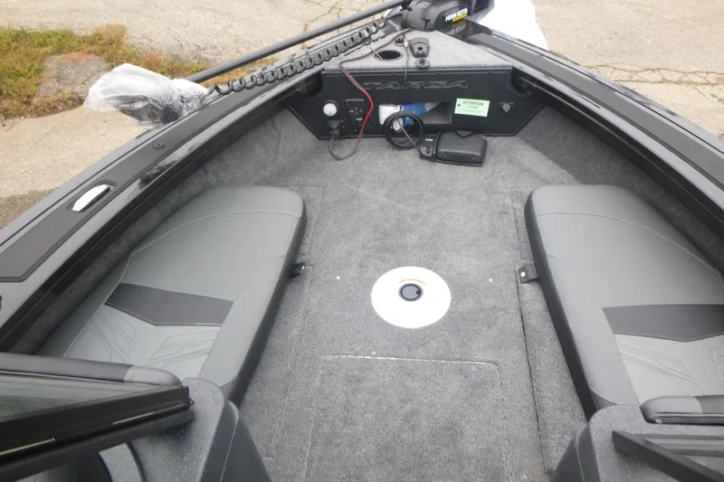 Slide: The Image of 2026 Tracker Targa V-19 Combo boat interior layout, featuring seating and storage compartments. - 6