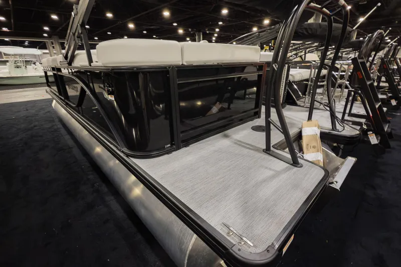 Slide: The Image of 2026 Godfrey Sweetwater 22' Cruise Special Edition Tritoon, model 2286 CSE, showcased indoors. - 2