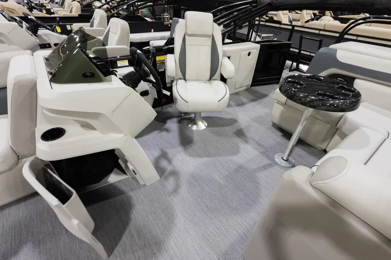Slide: The Image of Interior of 2026 Godfrey Sweetwater 22' Cruise Special Edition Tritoon, featuring helm and seating. - 8