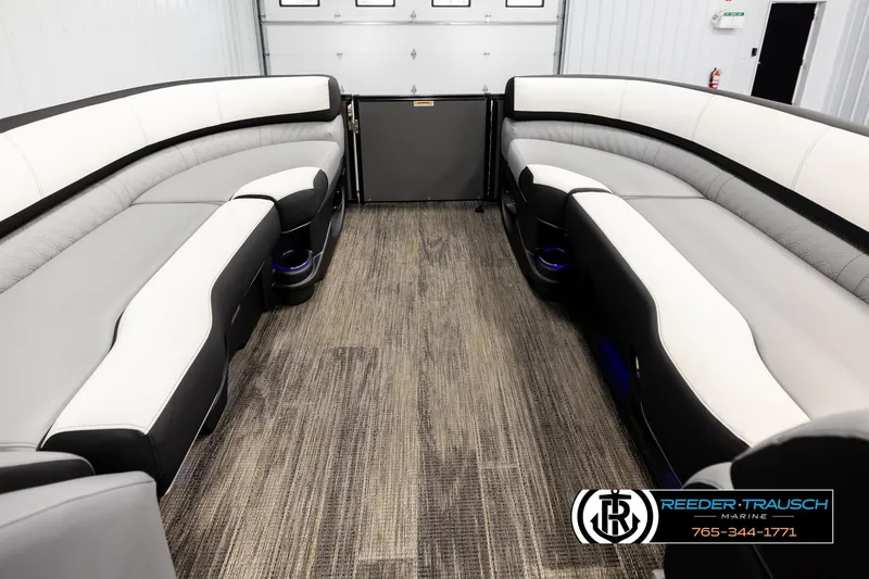 Slide: The Image of Luxurious interior of 2026 Avalon CAT QLS pontoon boat with plush seating. - 18