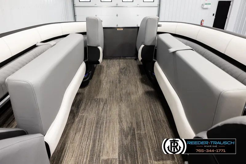 Slide: The Image of Interior of 2026 Avalon CAT QLS boat with modern seating and carpeted flooring. - 20