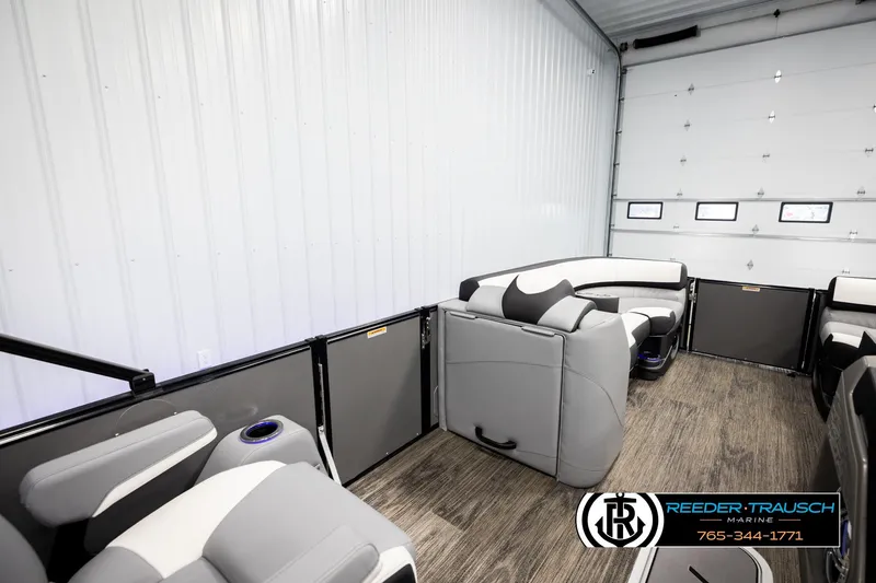 Slide: The Image of Luxurious interior of 2026 Avalon CAT QLS pontoon boat in showroom. - 21