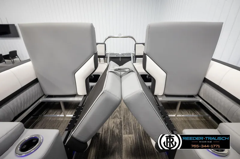 Slide: The Image of Luxurious interior of 2026 Avalon CAT QLS boat with modern seating and cup holders. - 25