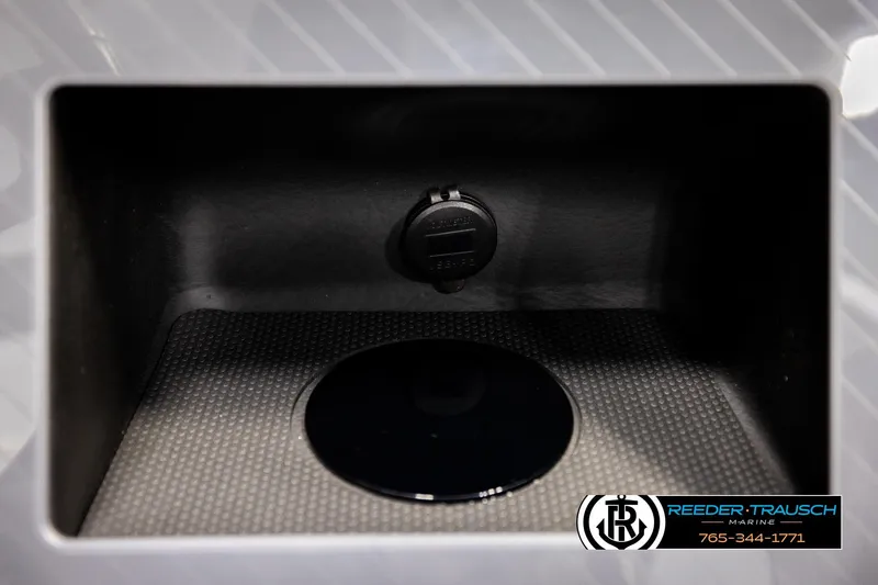 Slide: The Image of Interior compartment of 2026 Avalon CAT QLS boat, featuring a textured surface and plug. - 33