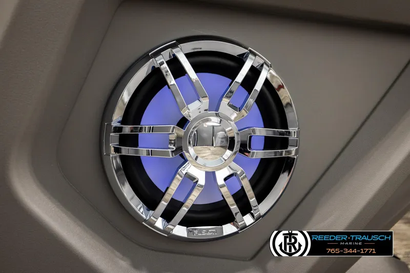 Slide: The Image of Chrome speaker with blue light on Avalon CAT QLS 2026, Reeder-Trausch Marine branding. - 40