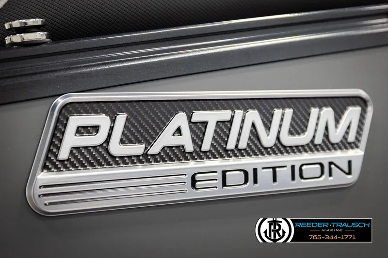 Slide: The Image of Platinum Edition badge on 2026 Avalon CAT QLS, featuring sleek carbon fiber design. - 50