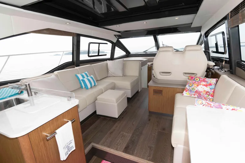 Slide: The Image of Luxurious interior of 2017 Sea Ray Sundancer 460 yacht with modern seating and decor. - 24