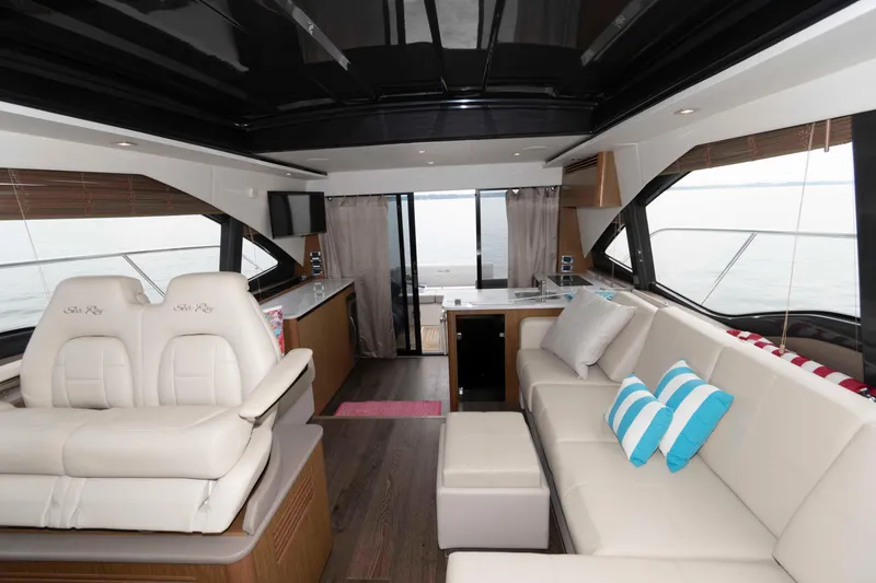Slide: The Image of Luxurious interior of 2017 Sea Ray Sundancer 460 yacht with plush seating and modern amenities. - 25