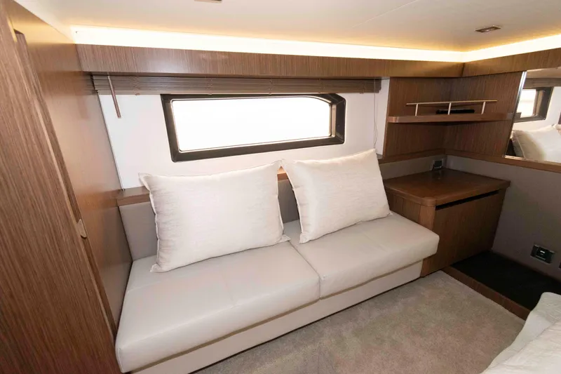 Slide: The Image of Luxurious interior of 2017 Sea Ray Sundancer 460 yacht with modern seating and wood accents. - 35