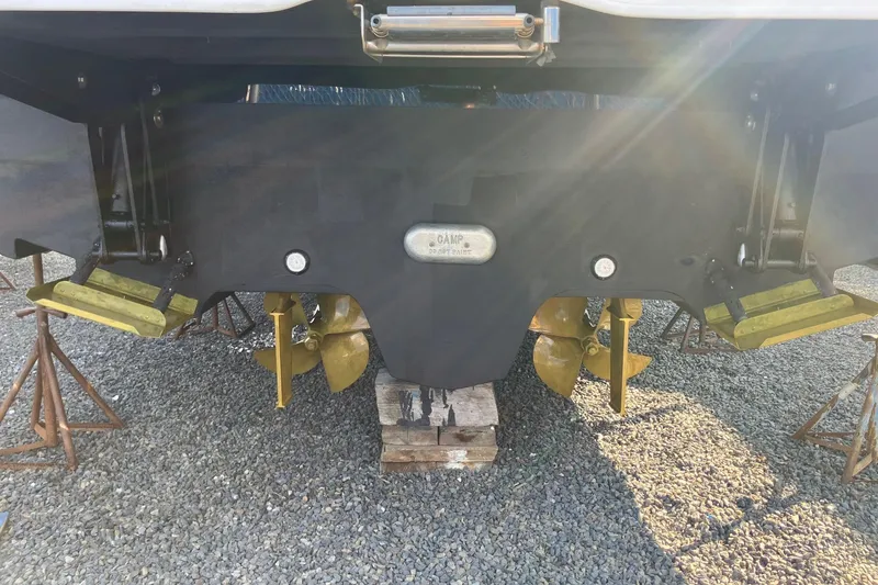 Slide: The Image of 2017 Sea Ray Sundancer 460 boat propellers and rudders on dry dock. - 47