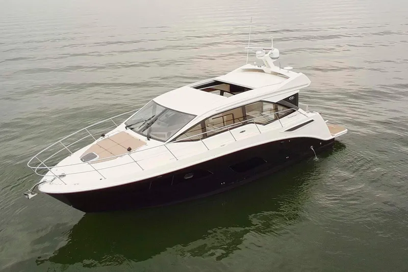 Slide: The Image of 2017 Sea Ray Sundancer 460 yacht cruising on calm waters. - 5