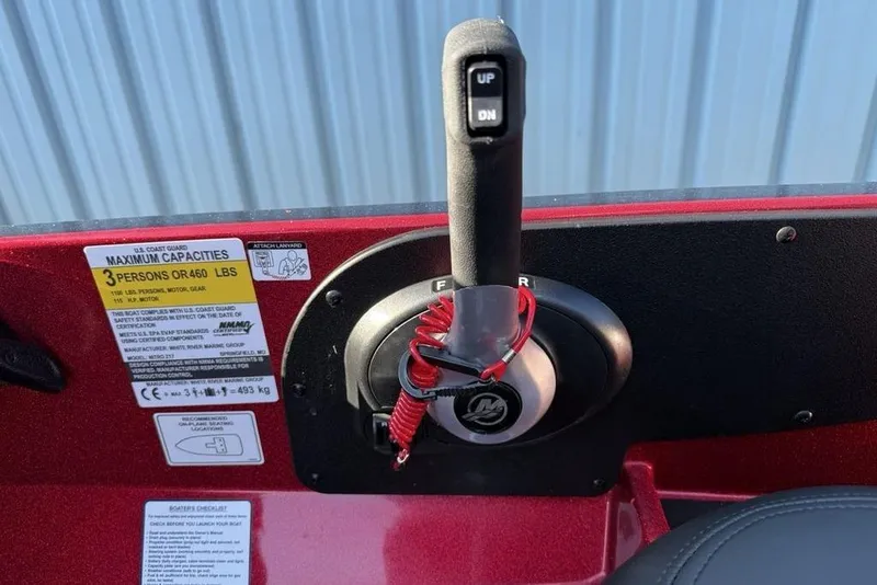 Slide: The Image of Throttle control of 2026 Nitro Z17 boat with capacity label, red safety lanyard attached. - 16