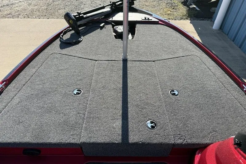 Slide: The Image of 2026 Nitro Z17 boat deck with gray carpet and storage compartments. - 6