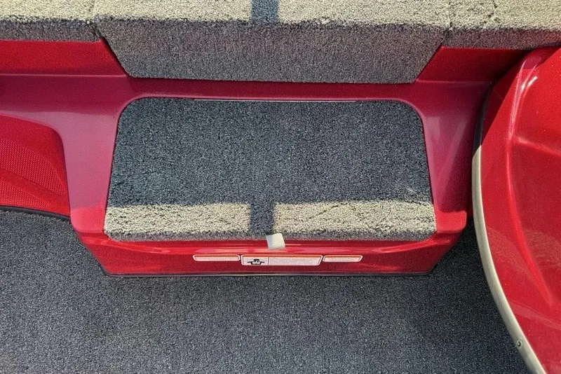 Slide: The Image of Red and gray carpeted interior of a 2026 Nitro Z17 boat. - 7