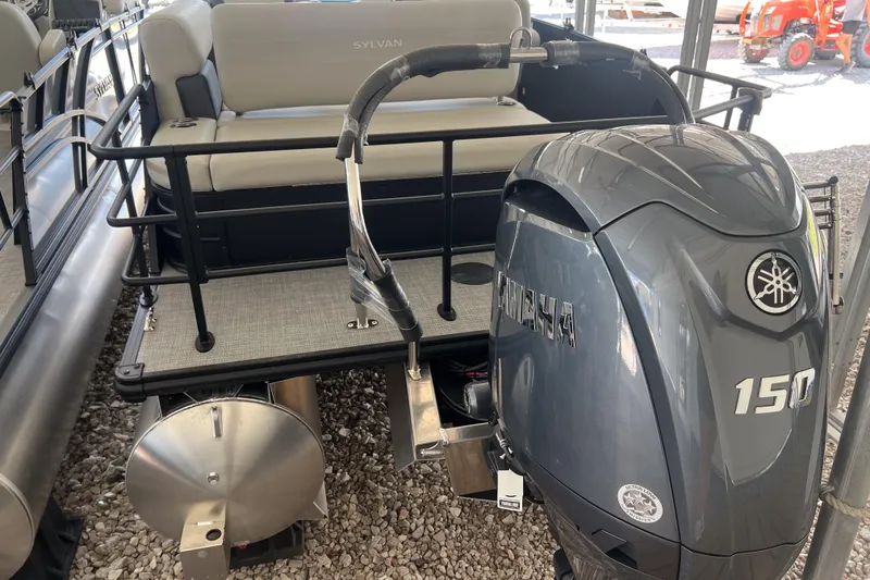 Slide: The Image of 2026 Sylvan Mirage 822 CLZ pontoon boat with Yamaha 150 engine, rear view. - 22