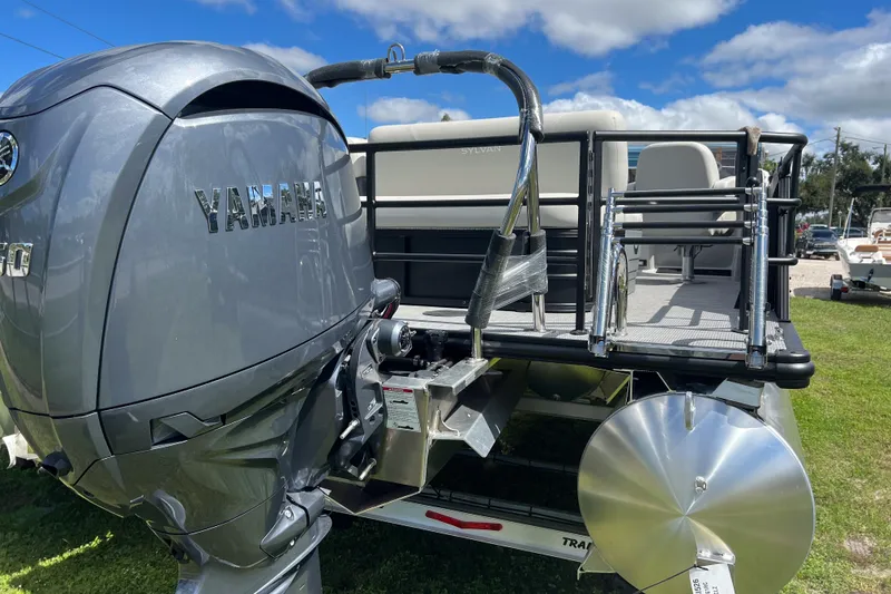 Slide: The Image of 2026 Sylvan Mirage 822 CLZ pontoon boat with Yamaha engine, rear view. - 4