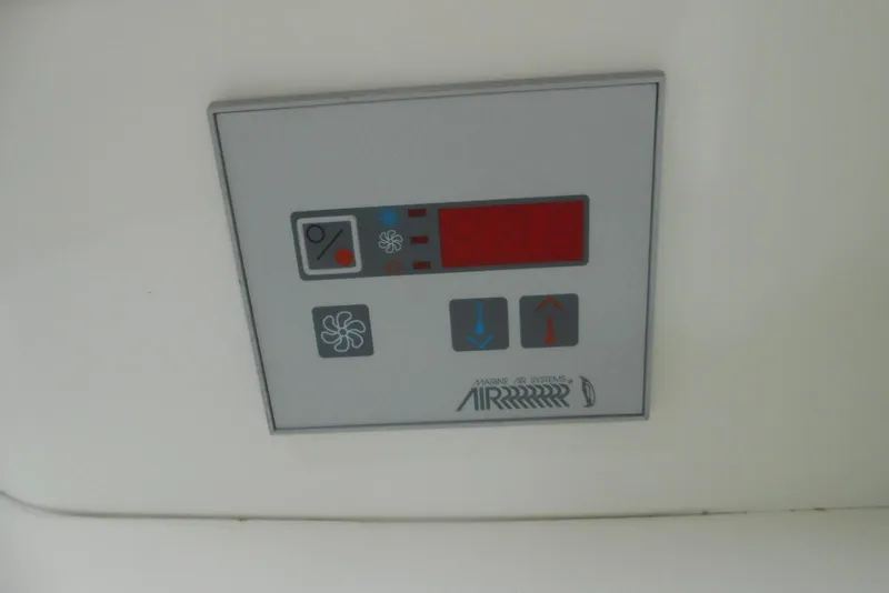 Slide: The Image of Control panel of a 2004 Formula 27 Performance Cruiser's marine air system. - 14