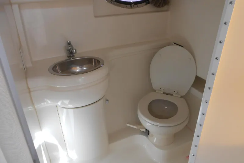 Slide: The Image of 2004 Formula 27 Performance Cruiser bathroom with sink and toilet. - 17