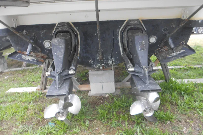 Slide: The Image of 2004 Formula 27 Performance Cruiser with dual propellers on land. - 30