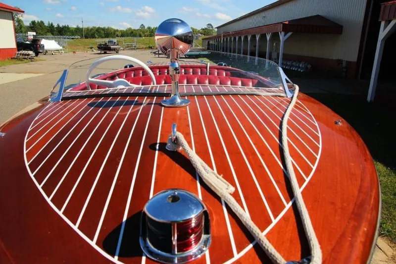 Slide: The Image of 1948 Chris-Craft 35 Double Cabin boat with wooden deck and classic steering wheel. - 10