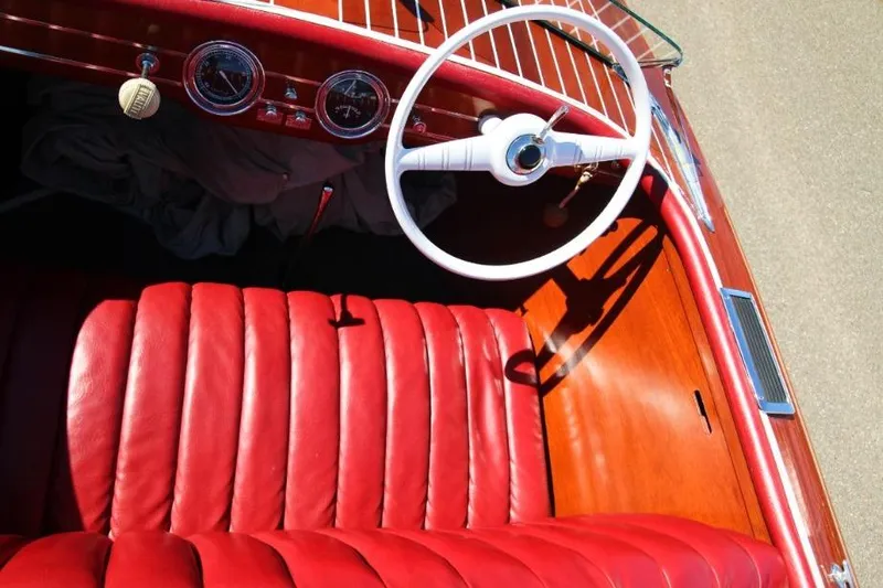 Slide: The Image of 1948 Chris-Craft 35 Double Cabin with red leather interior and blue strap. - 12