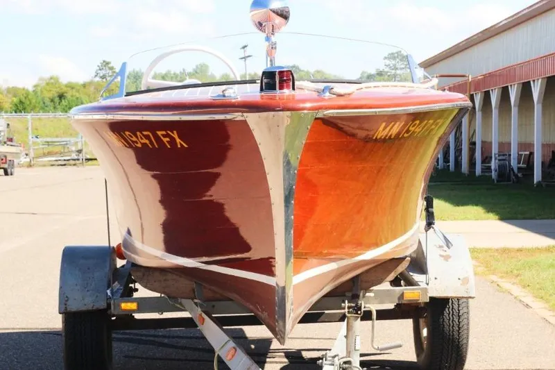 Slide: The Image of 1948 Chris-Craft 35 Double Cabin boat on trailer, showcasing classic wooden design. - 3