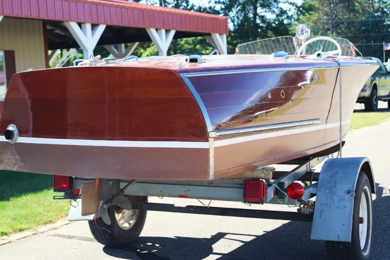Slide: The Image of 1948 Chris-Craft 35 Double Cabin boat on trailer, rear view, polished wood finish. - 7