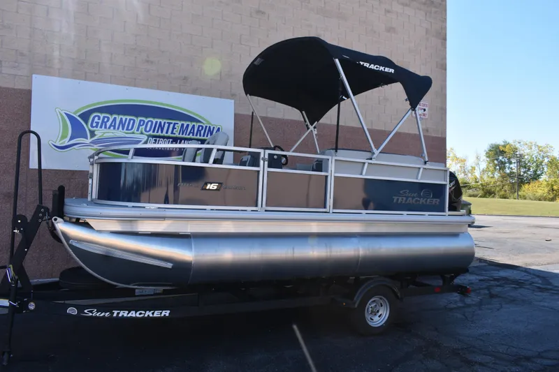 The Image of 2026 Sun Tracker Bass Buggy 16 XL Select pontoon boat at Grand Pointe Marina. - 0
