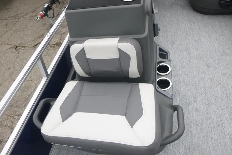 Slide: The Image of 2026 Sun Tracker Bass Buggy 16 XL Select boat interior with steering console and captain's chair. - 10