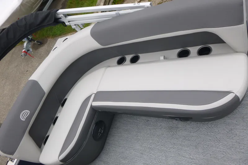 Slide: The Image of 2026 Sun Tracker Bass Buggy 16 XL Select boat seats, gray and white upholstery. - 12