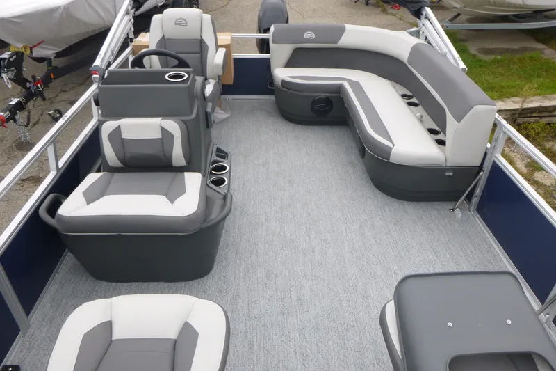 Slide: The Image of 2026 Sun Tracker Bass Buggy 16 XL Select pontoon boat with Mercury outboard motor. - 6