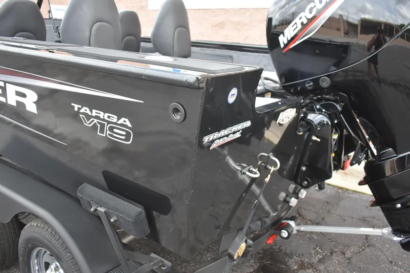 Slide: The Image of 2026 Tracker Targa V-19 WT boat with Mercury engine, rear view. - 81