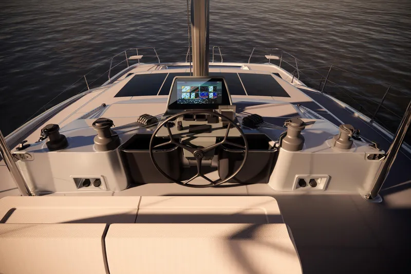 Slide: The Image of Helm of 2026 Aquila 50 Sail yacht with navigation controls and ocean view. - 15