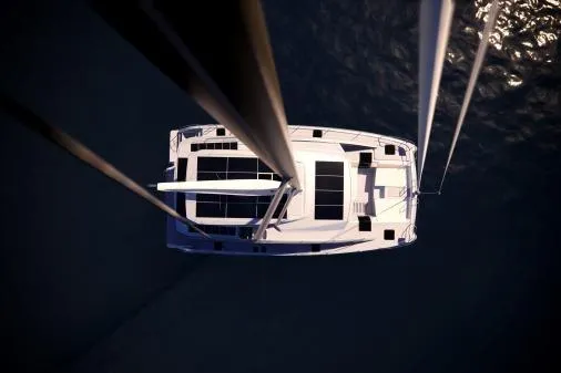 Slide: The Image of Aerial view of 2026 Aquila 50 Sail catamaran on water. - 24