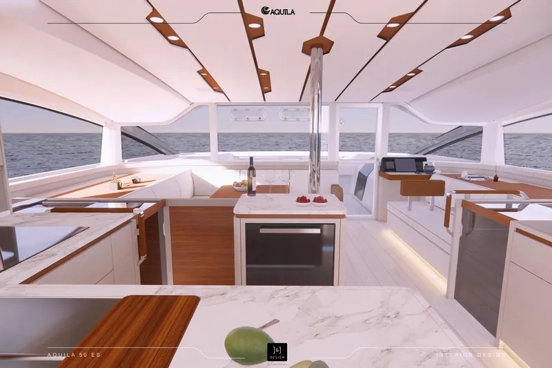 Slide: The Image of Luxurious interior of 2026 Aquila 50 Sail yacht with modern kitchen and ocean view. - 4