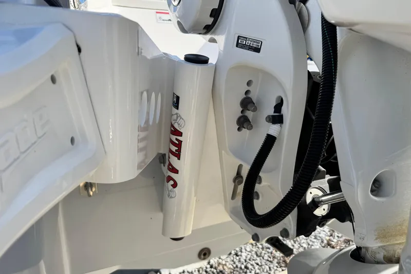 Slide: The Image of Close-up of 2023 Robalo 266 Cayman boat engine components and hydraulic system. - 34