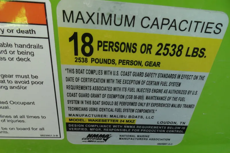 Slide: The Image of 2018 Malibu Wakesetter 24 MXZ capacity label, 18 persons or 2538 lbs. - 17