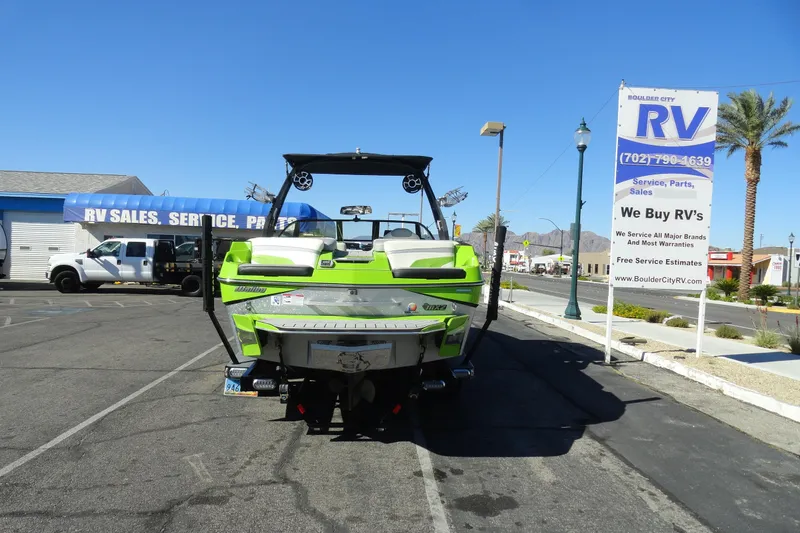 Slide: The Image of 2018 Malibu Wakesetter 24 MXZ boat parked at RV sales lot. - 30
