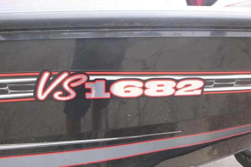 Slide: The Image of 2020 Ranger VS1682 WT boat model logo on black surface. - 16