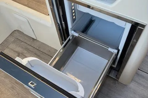 Slide: The Image of Navan C30 2025 model with open storage compartments, showcasing modern design and functionality. - 31