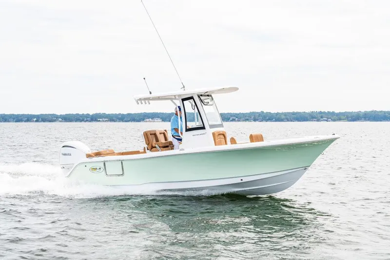 The Image of 2026 Sea Hunt Ultra 235 SE boat cruising on open water. - 0