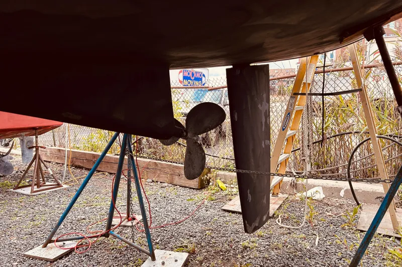Slide: The Image of Underwater view of a 2001 Beneteau 411 sailboat's propeller and rudder. - 36