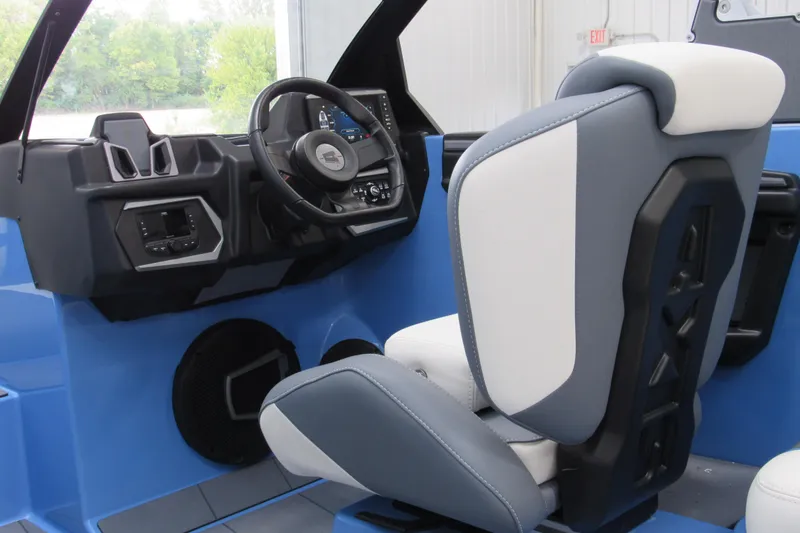 Slide: The Image of 2024 Axis T220 boat interior with modern dashboard and comfortable seating. - 6