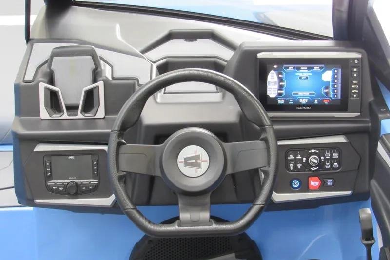 Slide: The Image of 2024 Axis T220 boat dashboard with steering wheel and digital display. - 7