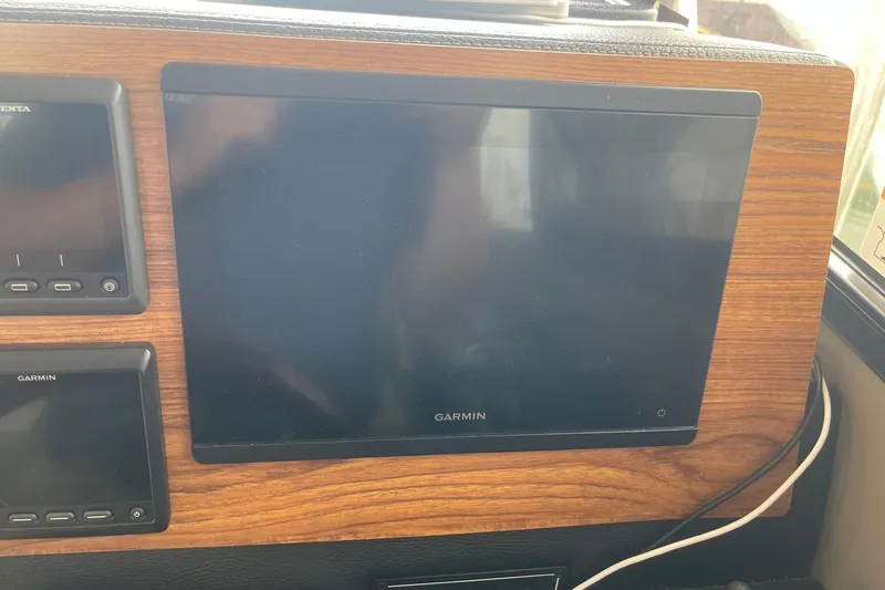 Slide: The Image of Garmin display panel on 2022 Cutwater C-30 Sedan boat dashboard. - 55