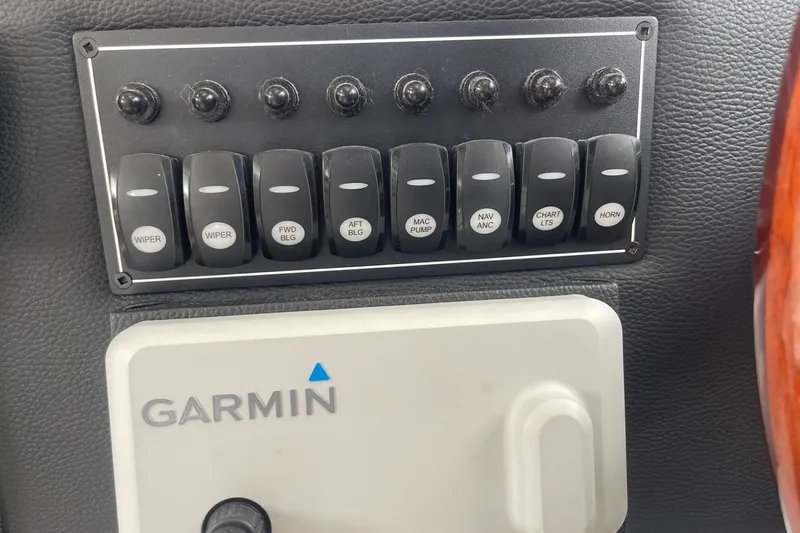 Slide: The Image of Control panel of a 2022 Cutwater C-30 Sedan with Garmin device. - 57